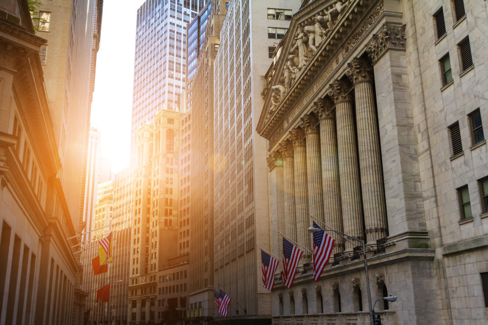 Sunlight shines on the historic buildings of the financial district in lower Manhattan, New York City near Wall Street. (Photo: Getty Images)