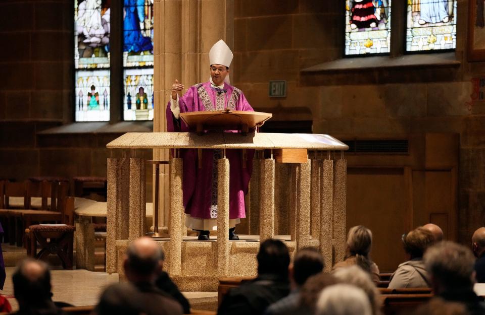 Bishop Earl Fernandes speaks to parishioners during Ash Wednesday Mass at St. Joseph Cathedral in downtown Columbus on Feb. 22.