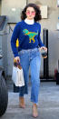 <p>Gomez showed off her unique sense of style in Los Angeles when she donned a dinosaur-adorned Coach sweater ($695; <a rel="nofollow noopener" href="http://click.linksynergy.com/fs-bin/click?id=93xLBvPhAeE&subid=0&offerid=460311.1&type=10&tmpid=21551&RD_PARM1=https%3A%2F%2Fwww.shopspring.com%2Fproducts%2F28185738%3Fgclid%3DCj0KEQiAh4fEBRCZhriIjLfArrQBEiQArzzDASYNZtsRbN8nOxgwitQOpltjkl2t42eloOi2e_O3hIsaAmEM8P8HAQ&u1=ISSelenaDinoIJJan" target="_blank" data-ylk="slk:spring.com;elm:context_link;itc:0;sec:content-canvas" class="link ">spring.com</a>) over a white turtleneck. High-waisted jeans, rose-hued sunglasses, and Kurt Geiger pumps ($230; <a rel="nofollow noopener" href="https://www.kurtgeiger.us/women/shoes/courts/ellen-taupe-suede-kurt-geiger-london" target="_blank" data-ylk="slk:kurtgeiger.us;elm:context_link;itc:0;sec:content-canvas" class="link ">kurtgeiger.us</a>) balanced out her ensemble.</p>