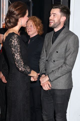 <p>YUI MOK/POOL/AFP via Getty</p> Kate Middleton and Jack Whitehall chat after the Royal Variety Performance on Nov. 13, 2014.