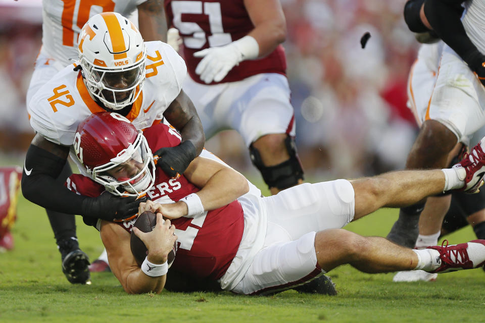 NORMAN, OKLAHOMA – SEPTEMBER 21: Defensive lineman Tyre West #42 of the Tennessee Volunteers sacks quarterback Jackson Arnold #11 of the Oklahoma Sooners for a loss in the first quarter at Gaylord Family Oklahoma Memorial Stadium on September 21, 2024 in Norman, Oklahoma. (Photo by Brian Bahr/Getty Images)