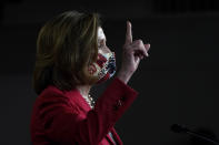 House Speaker Nancy Pelosi of Calif., speaks to the media, Wednesday Dec. 30, 2020, on Capitol Hill in Washington. (AP Photo/Jacquelyn Martin)