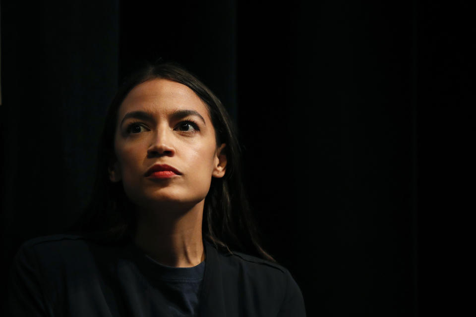 New York congressional candidate Alexandria Ocasio-Cortez listens to a speaker at a fundraiser Thursday, Aug. 2, 2018, in Los Angeles. The 28-year-old startled the party when she defeated 10-term U.S. Rep. Joe Crowley in a New York City Democratic primary. Ocasio-Cortez is a rising liberal star who is challenging the Democratic Party establishment. (AP Photo/Jae C. Hong)