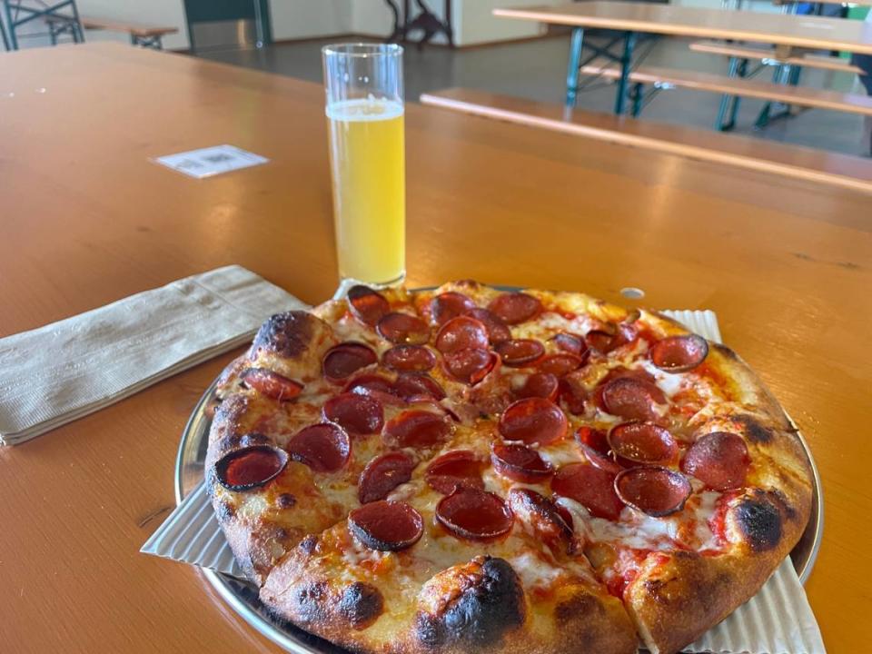 The White Duck Hefeweizen and pepperoni pizza at Larrabee Lager Company in Bellingham, Wash. on Aug. 2, 2023.