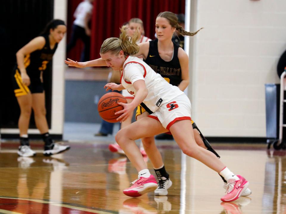 Ava Heller drives the ball during Sheridan's 45-30 win against visiting Tri-Valley on Saturday at Glen Hursey Gymnasium.