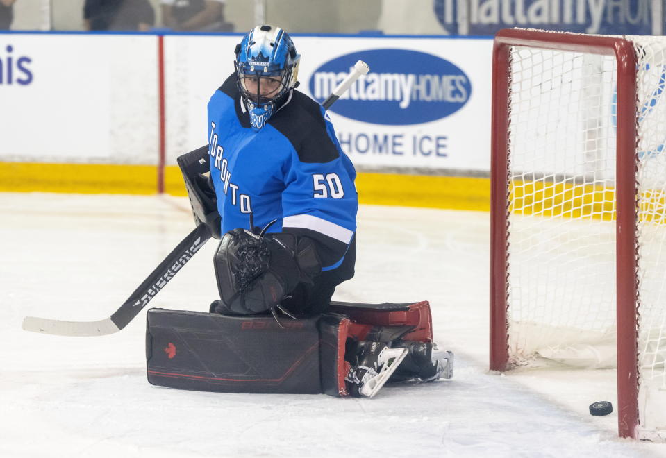 Toronto goaltender Kristen Campbell looks back at the puck in the net for the the first goal in PWHL history by New York defender Ella Shelton in Toronto on Monday, Jan. 1, 2024. (Frank Gunn /The Canadian Press via AP)