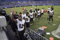 Baltimore Ravens' Rashad Bateman (120 waves to fans after practice at NFL football training camp Saturday, July 31, 2021, in Baltimore. (AP Photo/Gail Burton)