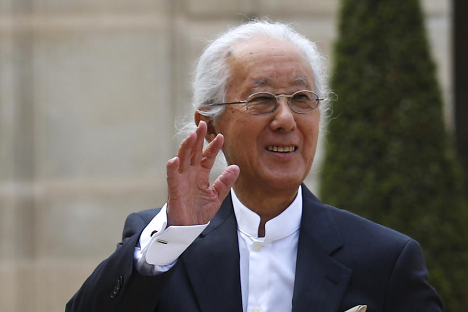 FILE - Japan's architect Arata Isozaki arrives at the Elysee Palace in Paris on May 24, 2019. Isozaki, a Pritzker-winning Japanese architect known as a post-modern giant who blended culture and history of the East and the West in his designs, has died of old age. He was 91. (AP Photo/Francois Mori, File)