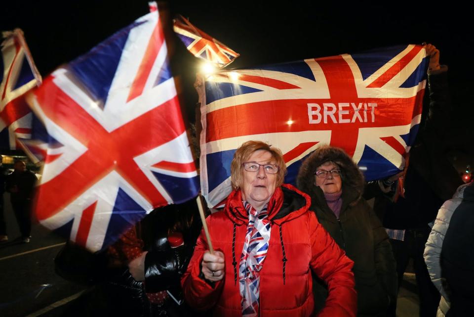 Pushing a Brexit referendum backfired on then-Prime Minister David Cameron. <a href="https://www.gettyimages.com/detail/news-photo/pro-brexit-supporters-outside-stormont-in-belfast-as-the-uk-news-photo/1197857920?adppopup=true" rel="nofollow noopener" target="_blank" data-ylk="slk:Brian Lawless/PA Images via Getty Images;elm:context_link;itc:0" class="link ">Brian Lawless/PA Images via Getty Images</a>