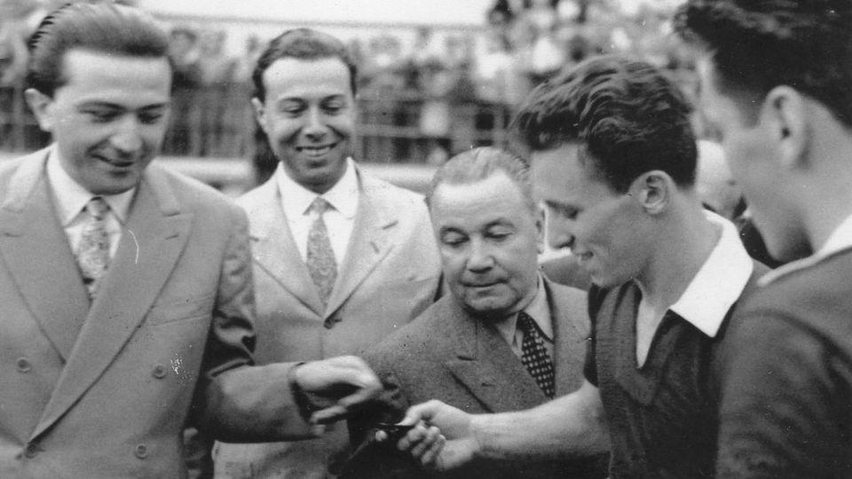 Giulio Andreotti (left) congratulates youth captain Motto (second on the right) with the championship title. - Courtesy Umberto Motto