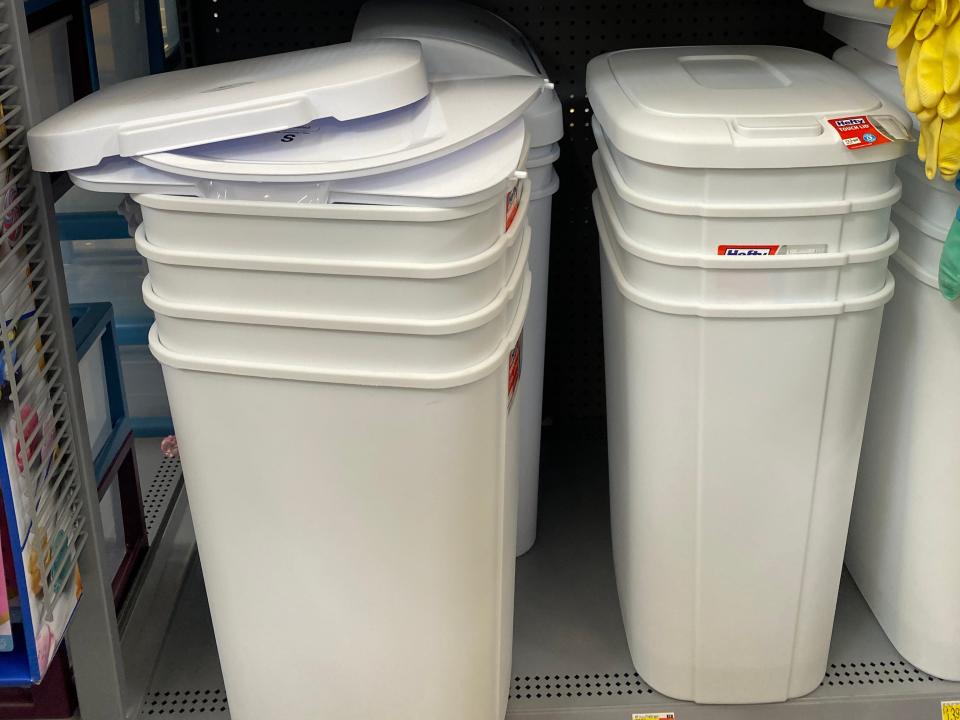 white plastic garbage cans