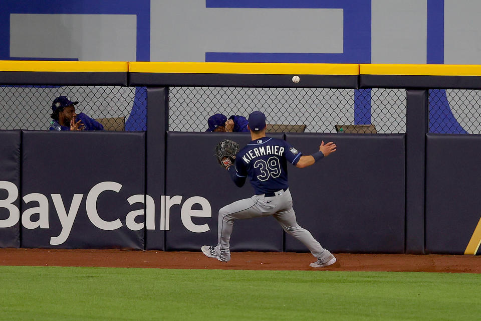 ARLINGTON, TEXAS - OCTOBER 20:  Kevin Kiermaier #39 of the Tampa Bay Rays fields a double off the wall hit by Justin Turner (not pictured) of the Los Angeles Dodgers during the sixth inning in Game One of the 2020 MLB World Series at Globe Life Field on October 20, 2020 in Arlington, Texas. (Photo by Ronald Martinez/Getty Images)