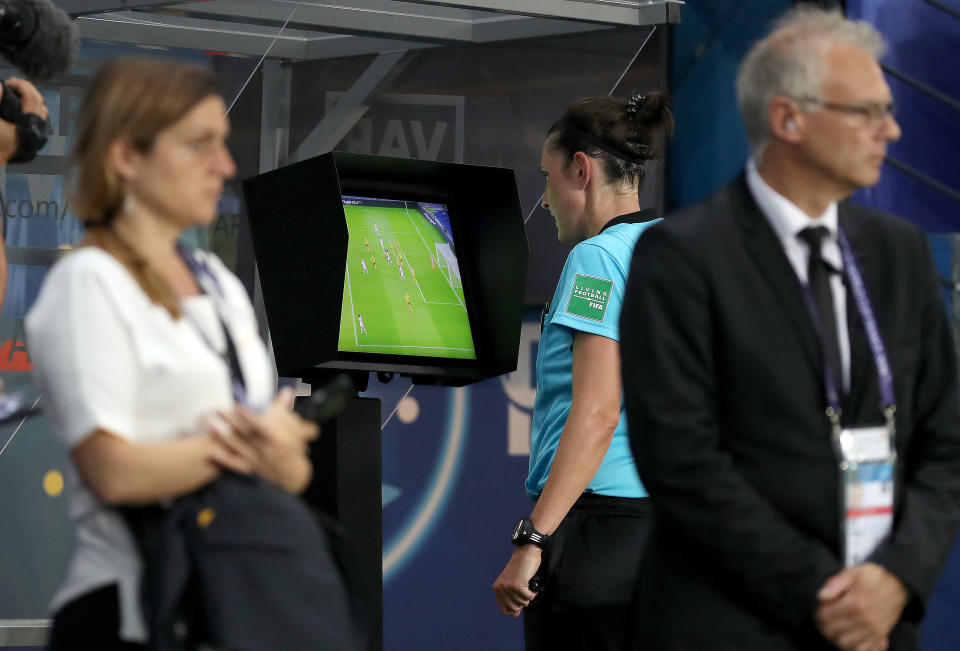 PARIS, FRANCE - JUNE 24: Referee Kate Jacewicz takes part in a VAR review during the 2019 FIFA Women's World Cup France Round Of 16 match between Sweden and Canada at Parc des Princes on June 24, 2019 in Paris, France. (Photo by Catherine Ivill - FIFA/FIFA via Getty Images)