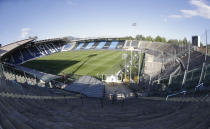 FILE - In this Sunday, June 21, 2020 filer, a view of the empty stadium, due to the coronavirus restriction measures, prior to the Serie A soccer match between Atalanta and Sassuolo, in Bergamo, Italy. For players, the pandemic has meant a congested season that poses fitness challenges, let alone trying to avoid coronavirus infections. Financially playing the delayed tournament is essential for UEFA. For fans, the EURO 2020 24-team event should be the first chance for the widespread return of fans to stadiums across Europe since March 2020, assuming new restrictions aren't imposed. (AP Photo/Luca Bruno, File)