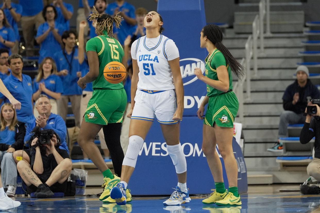 UCLA center Lauren Betts (51) reacts after drawing a foul call against Oregon during the first half of an NCAA college basketball game in Los Angeles, Friday, Jan. 5, 2024.