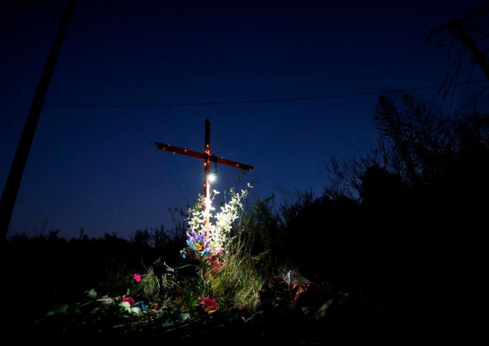 Lights illuminate a memorial for Lyric Woods, 14, and Devin Clark, 18, in Orange County on Tuesday, Sept. 20, 2022. The Orange County Sheriff’s Office said Monday the two young people found shot and killed Sunday in western Orange County are Woods and Clark.