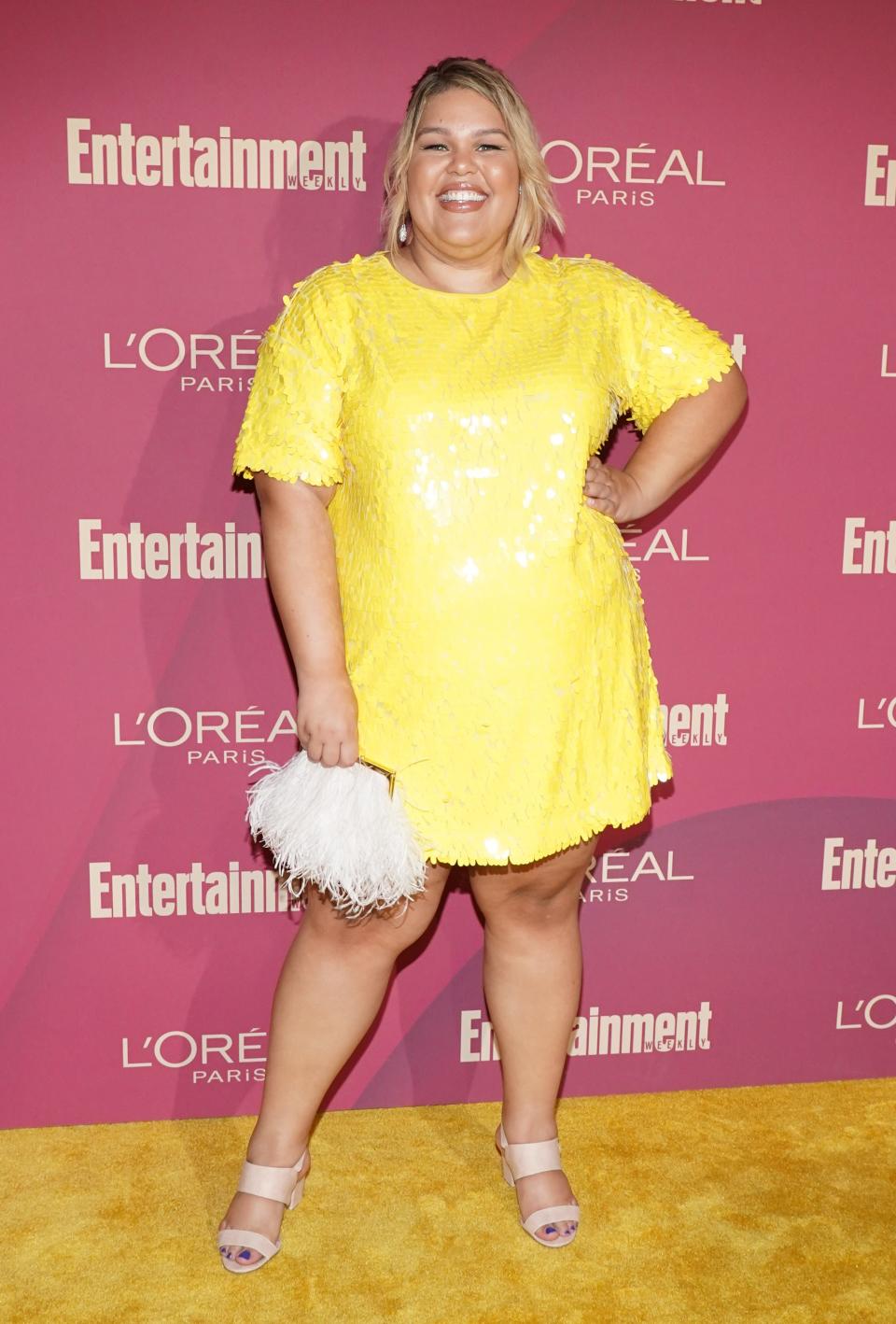 Britney Young wearing Eloquii, Kate Spade New York, and Modcloth