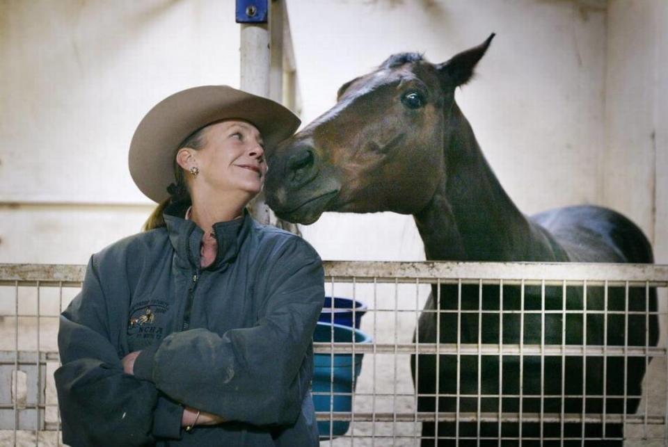 Alice Walton, shown with a cutting horse at her ranch near Fort Worth, is on the board of the Walton Family Foundation, which gave $20 million to the Amon Carter Museum of American Art in Fort Worth.