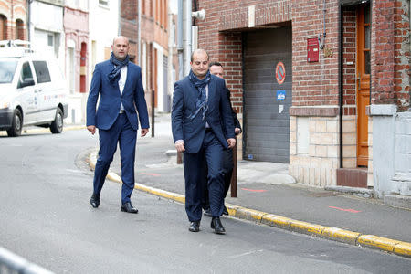 David Rachline (R), mayor of Frejus and campaign director of Marine Le Pen, French National Front (FN) political party leader and candidate for French 2017 presidential election, arrives at a polling station in the first round of 2017 French presidential election in Henin-Beaumont, northern France, April 23, 2017. REUTERS/Charles Platiau