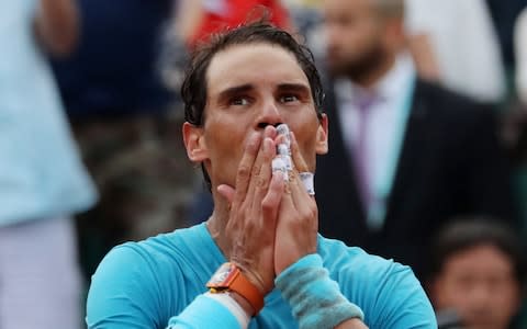 Nadal allows his 11th title sink in - Credit: Reuters