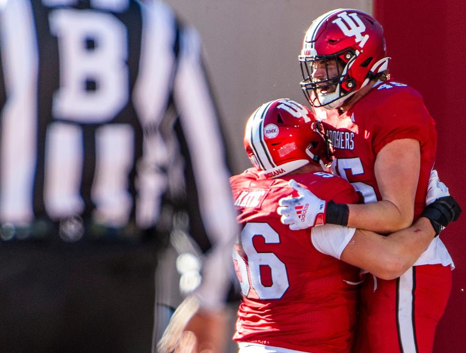 Indiana's Trey Walker (45) celebrates his touchdown with Noah Bolticoff (66) during the second half of the Indiana versus Michigan State football game at Memorial Stadium on Saturday, Nov. 18, 2023.