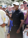 <p>Tiger Woods smiles on the putting green during practice for the 2007 Masters golf tournament at the Augusta National Golf Club in Augusta, Ga., Wednesday, April 4, 2007. First round play begins on Thursday. (AP Photo/Chris O’Meara) </p>