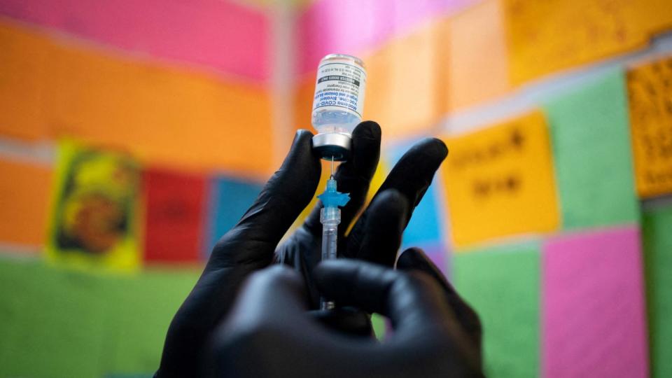 PHOTO: A doctor draws the Moderna coronavirus disease (COVID-19) booster vaccine  at a pharmacy in Schwenksville, Penn., Sept. 8, 2022.  (Hannah Beier/Reuters, FILE)