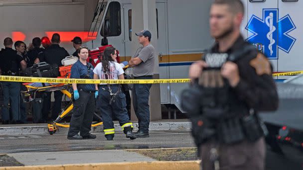 PHOTO: Emergency personnel gather after a shooting, July 17, 2022, at Greenwood Park Mall, in Greenwood, Ind. (Kelly Wilkinson/IndyStar via USA Today)