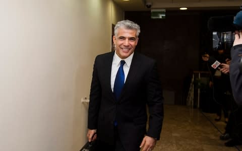 Yair Lapid, the leader of the centrist Yesh Atid party, is a possible replacement for Mr Netanyahu if there are elections - Credit: David Vaaknin-Pool/Getty Images