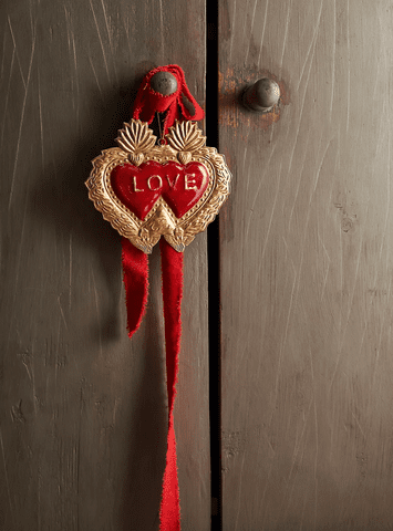 <p><a href="https://www.anthropologie.com/shop/burnished-heart-medallion-red-love?category=valentines-day-shop&color=060&type=STANDARD&size=One%20Size&quantity=1" data-component="link" data-source="inlineLink" data-type="externalLink" data-ordinal="1" rel="nofollow">Anthropologie</a></p>