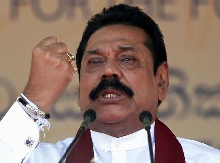 Sri Lanka's former president Mahinda Rajapaksa, who is contesting in the upcoming general election, speaks during the launch ceremony of his manifesto, in Colombo July 28, 2015. REUTERS/Dinuka Liyanawatte