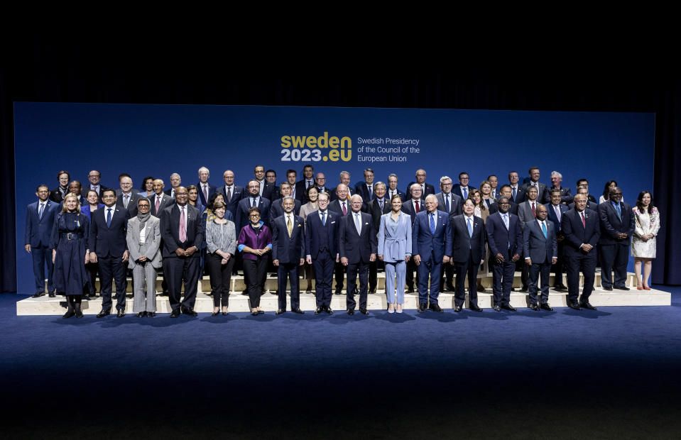 Participants pose for a family photo during an EU Indo-Pacific Ministerial Forum in connection to an informal meeting of EU foreign affairs ministers in Marsta outside Stockholm, Saturday, May 13, 2023.(Christine Olsson/TT News Agency via AP)