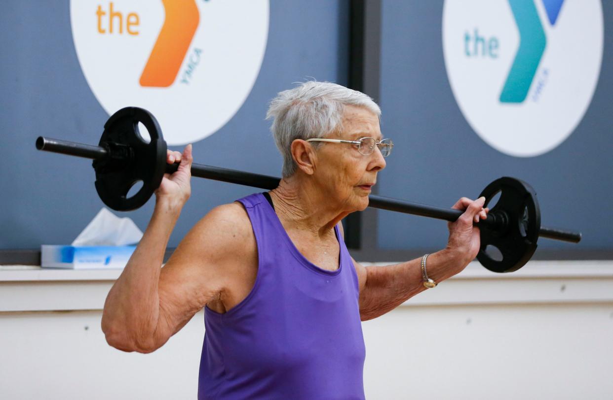 Betty Lassiter, 81, works out in a group exercise class at the Pat Jones YMCA on Monday, Jan. 10, 2022, 