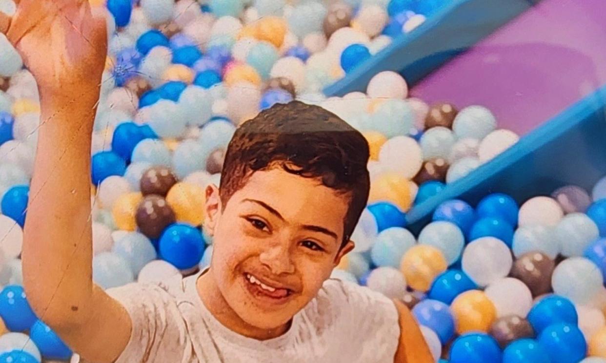 <span>Hussein Al Mansoory, who has Down syndrome and autism, went missing from an Auburn park on Saturday morning.</span><span>Photograph: NSW police</span>