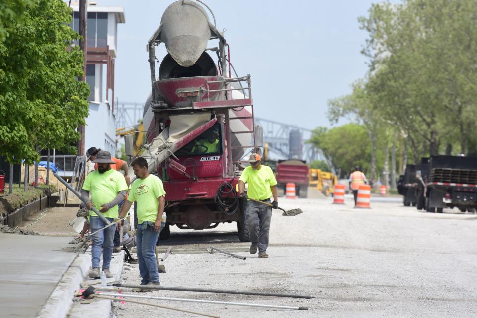 Construction crew continues work on Fort St., in downtown Port Huron on Friday, June 3, 2022. The city is expected to finish the first phase of reconstruction on Fort St., by July. Work will be paused during boat week.