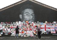 Marcus Rashford mural covered with messages of support after it was defaced following the Euro 2020 Final between Italy and England