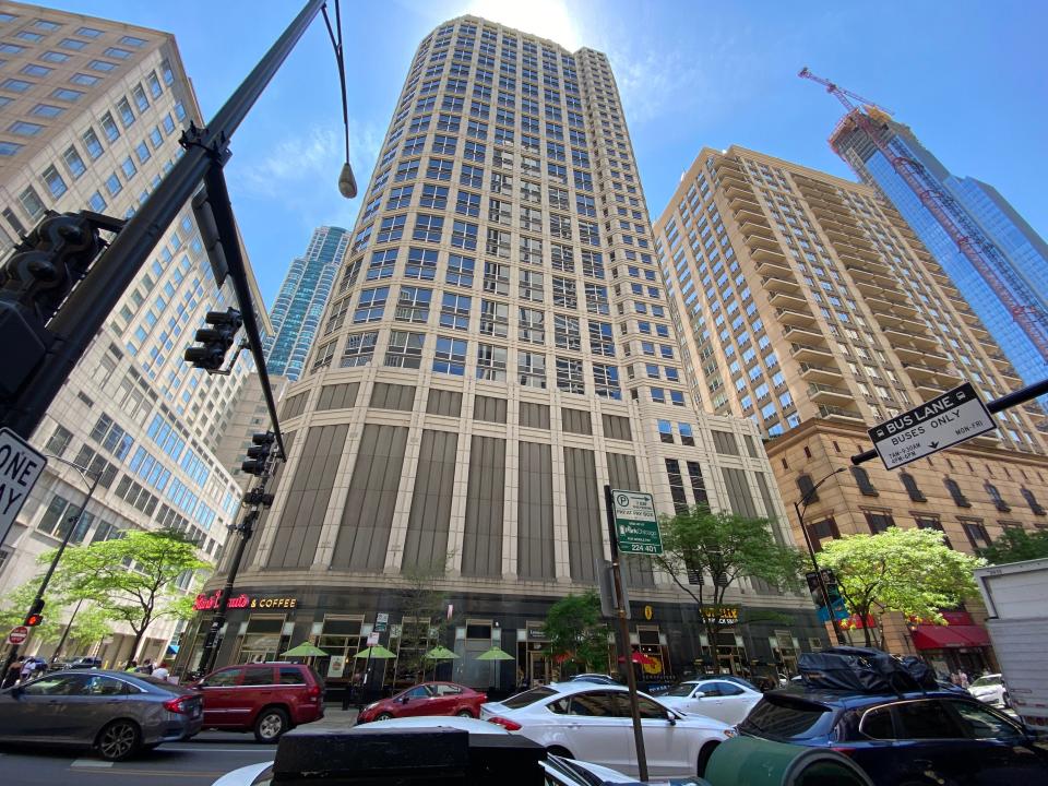 The exterior of 750 N. Rush next to buildings in chicago