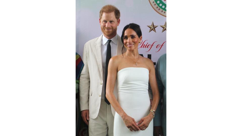 Britain's Prince Harry, Duke of Sussex, and Britain's Meghan, Duchess of Sussex, pose for a photo as they attend the program held in the Armed Forces Complex in Abuja, Nigeria on May 11, 2024. (Photo by Emmanuel Osodi/Anadolu via Getty Images)