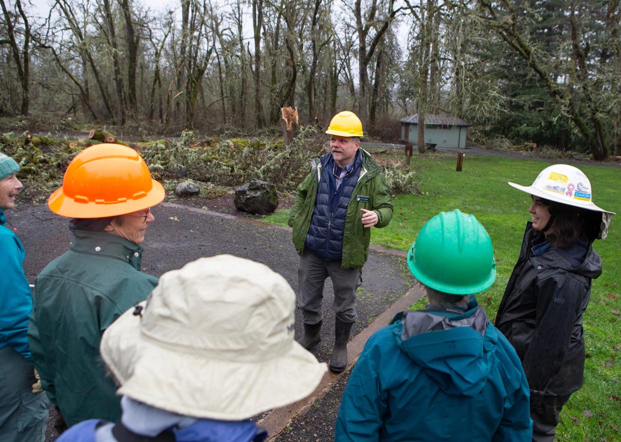 Brad van Appel, executive director Mt. Pisgah Arboretum organizes a group of volunteers for a cleanup crew Jan. 26.