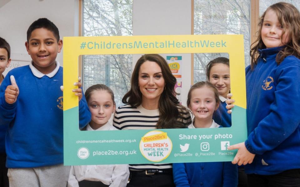 Kate made paper chains with pupils from a primary school in London's East End and chatted with them about how they cope with their feelings - PA Wire/Kensington Palace