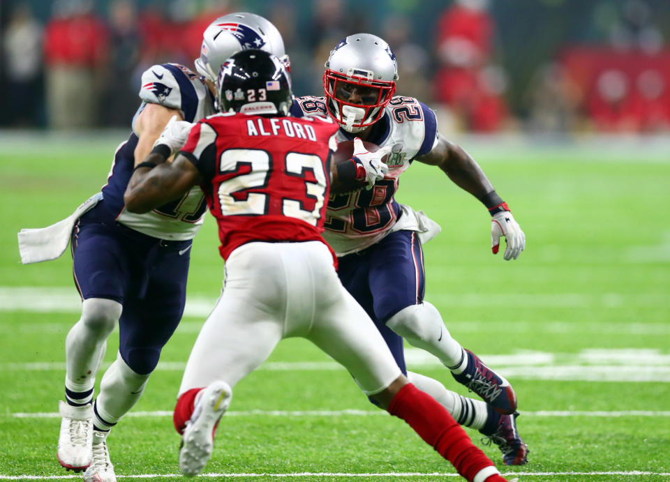 Feb 5, 2017; Houston, TX, USA; New England Patriots running back James White (28) runs the ball against the Atlanta Falcons in overtime during Super Bowl LI at NRG Stadium. Mandatory Credit: Mark J. Rebilas-USA TODAY Sports