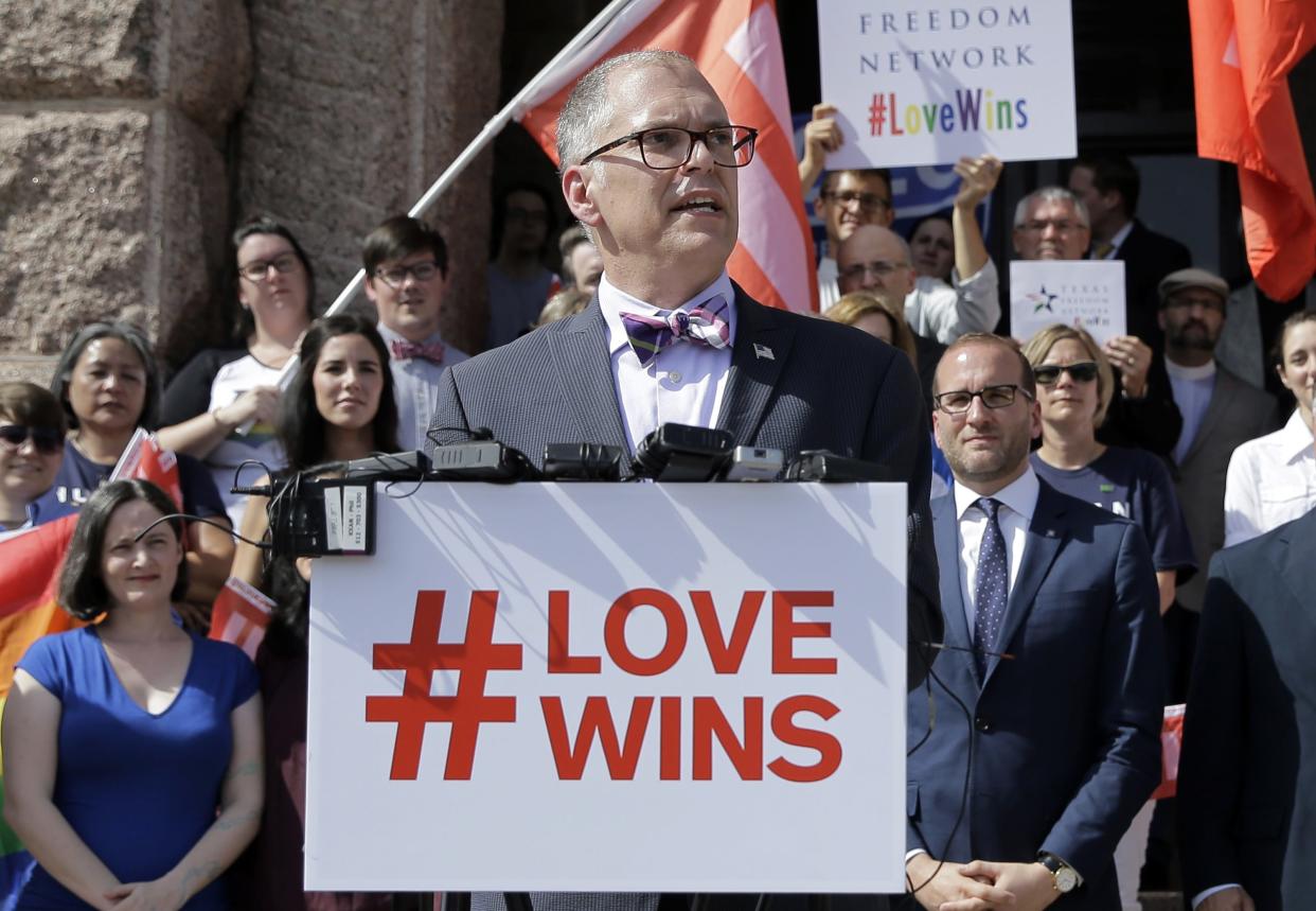 Jim Obergefell, the named plaintiff in the Obergefell v. Hodges Supreme Court case, is backed by supporters of the court's ruling, that state bans on same-sex marriage are unconstitutional under the 14th Amendment. The rally was held in Austin, Texas, in June 2015.