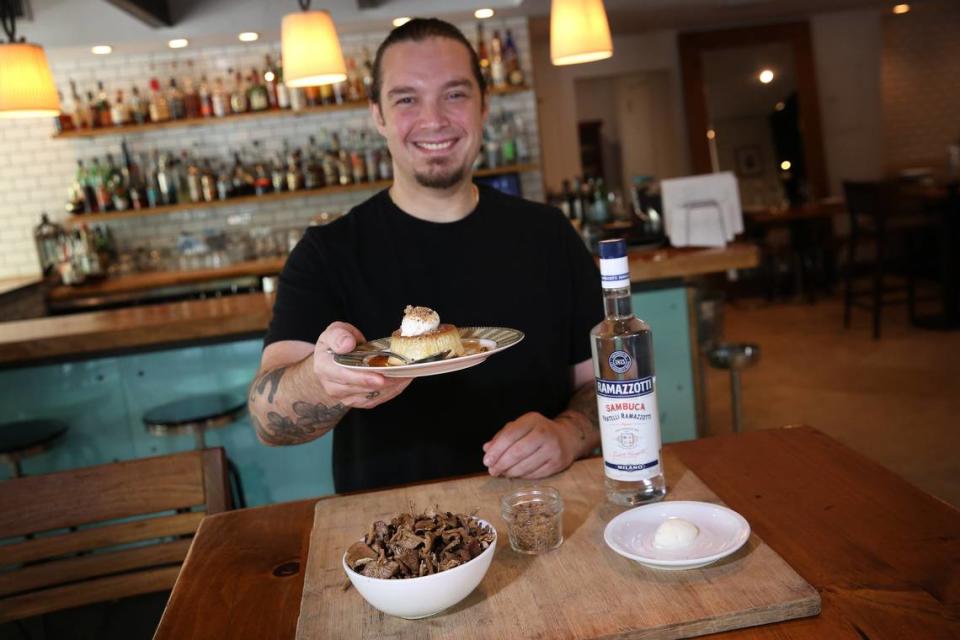 Michael Beltran, here with his famous mushroom flan at Ariete in Coconut Grove, praised his staff for earning a Michelin star. “The dishwashers, the porters, the polishers, the fry cooks, everybody earned that star,” he said.