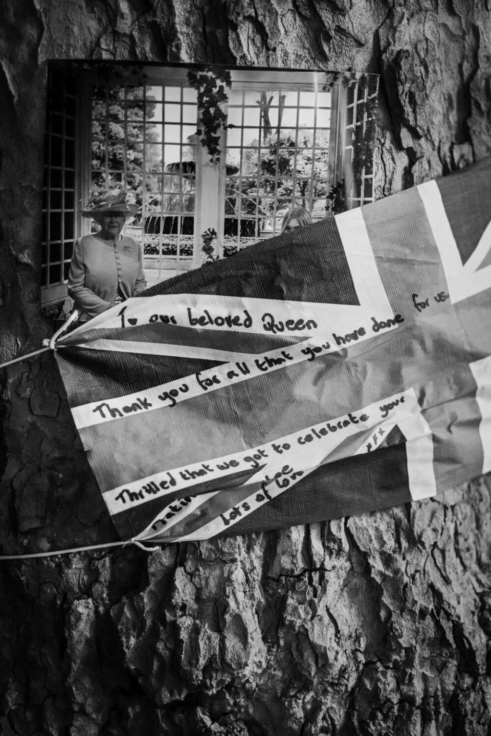 Memorial items left behind on trees along the route of the procession.