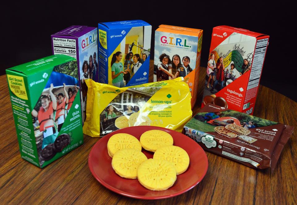 Seven of the eight varieties of Girl Scout cookies are shown here, including the Lemon-Ups, plated. Other varieties are, from left, Thin Mints, Samoas, Trefoils, Do-Si-Dos, Tagalongs, and S’mores. (Carol Kugler / Herald-Times)