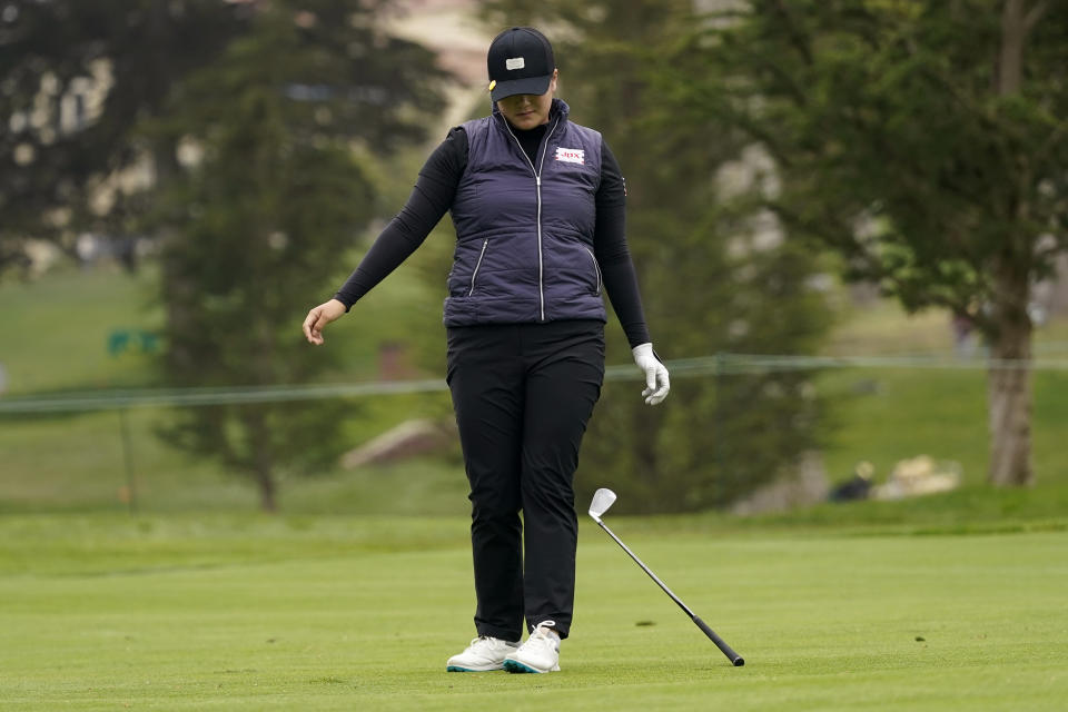 Angel Yin drops her club after her shot on the 12th fairway during the second round of the U.S. Women's Open golf tournament at The Olympic Club, Friday, June 4, 2021, in San Francisco. (AP Photo/Jeff Chiu)