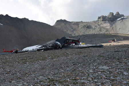 A general view of the accident site of a Junkers Ju-52 airplane of the local airline JU-AIR, which crashed at 2,450 meters (8,038 feet) above sea level near the mountain resort of Flims, Switzerland August 5, 2018. Kantonspolizei Graubunden/Handout via REUTERS. THIS IMAGE HAS BEEN SUPPLIED BY A THIRD PARTY.