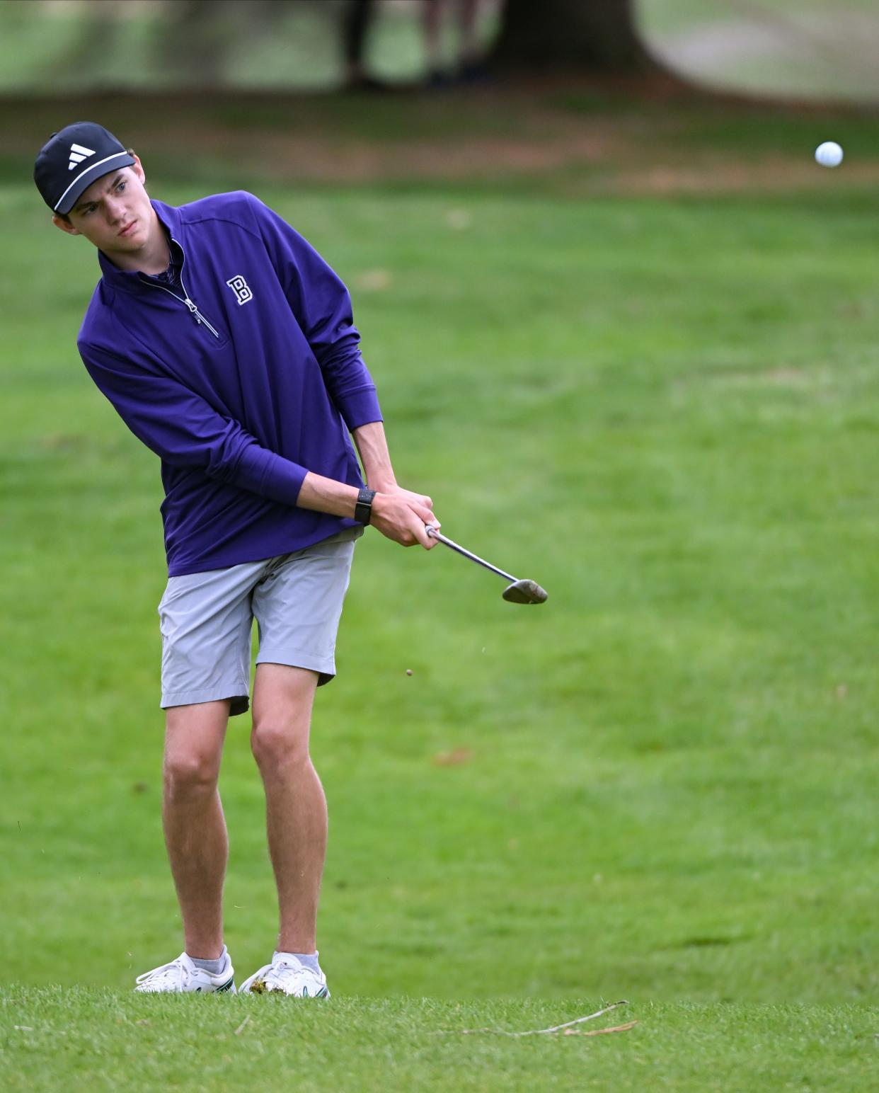 Bloomington South’s Happy Gilmore hits a shot during the golf match against Edgewood at Cascades Golf Course on Tuesday, April 9, 2024.