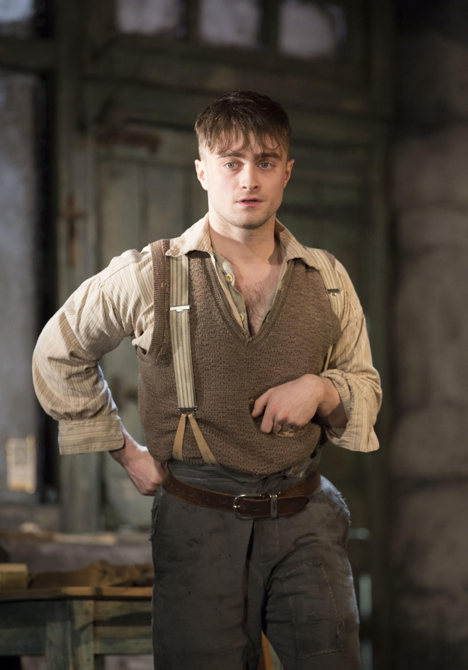 This image released by Boneau/Bryan-Brown shows Daniel Radcliffe performing in "The Cripple of Inishmaan," opening April 20 at the Cort Theatre in New York. (AP Photo/Boneau/Bryan-Brown, Johan Persson)