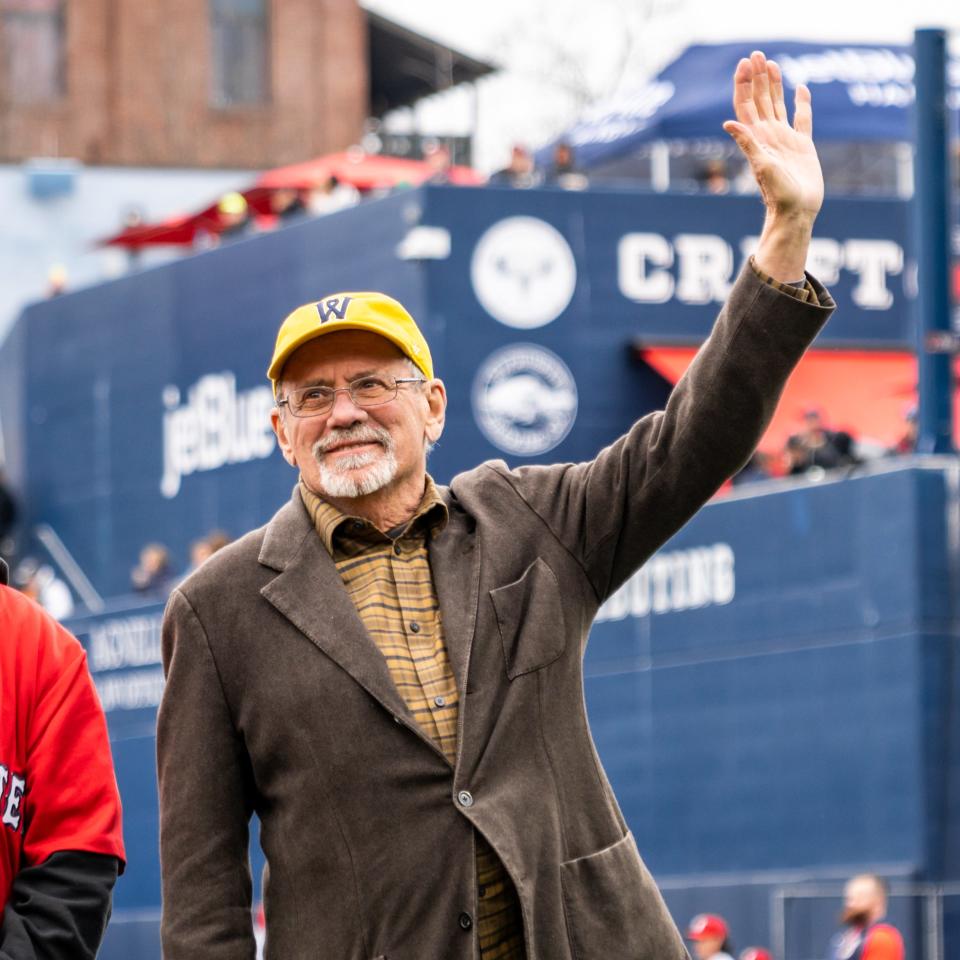 WooSox Chairman and Principal Owner Larry Lucchino waves to the crowd at Polar Park on Opening Day of the 2023 season.